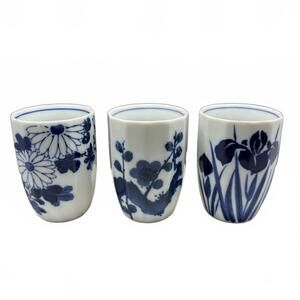 Set of three vintage Japanese blue and white porcelain teacups.